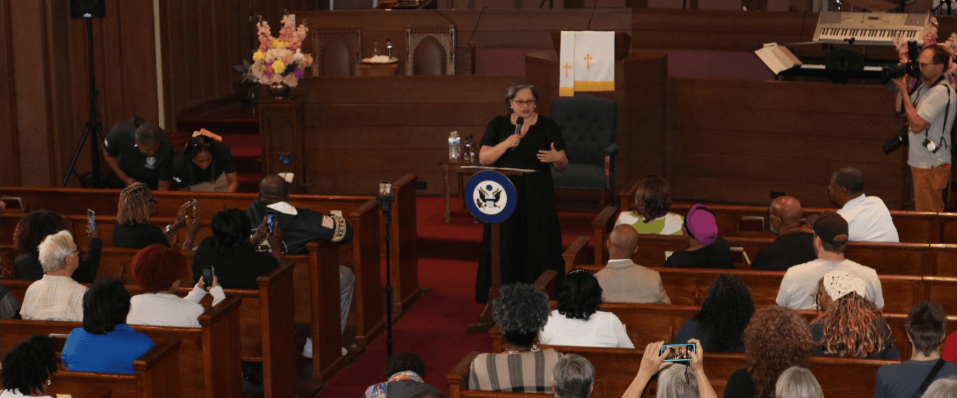 Photo of Rep. McClellan speaking at a town hall with the Henrico NAACP.