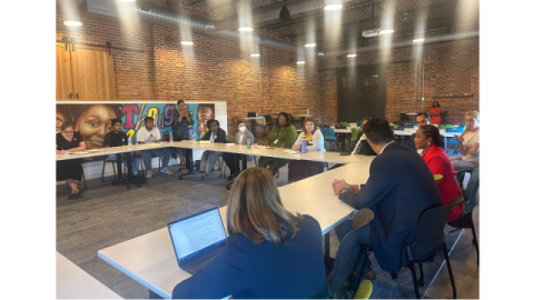 Rep. McClellan sits with particpants of her gun violence prevention roundtable