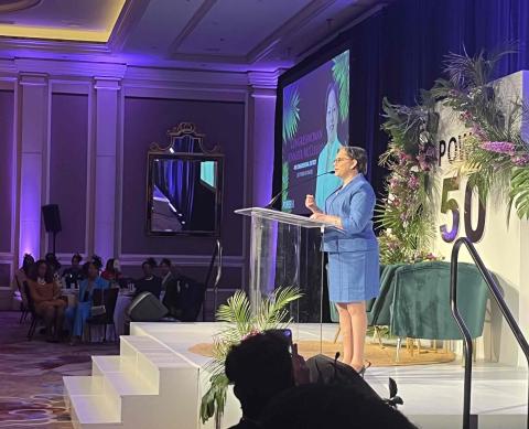 Rep. McClellan on stage at the USBC Women's Luncheon