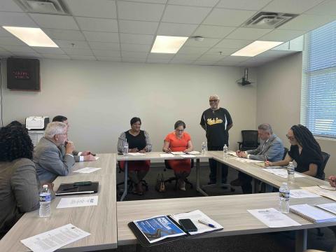 Rep. McClellan sits at a table with leadership from Charles City County, Prince George County, & Dinwiddie County.