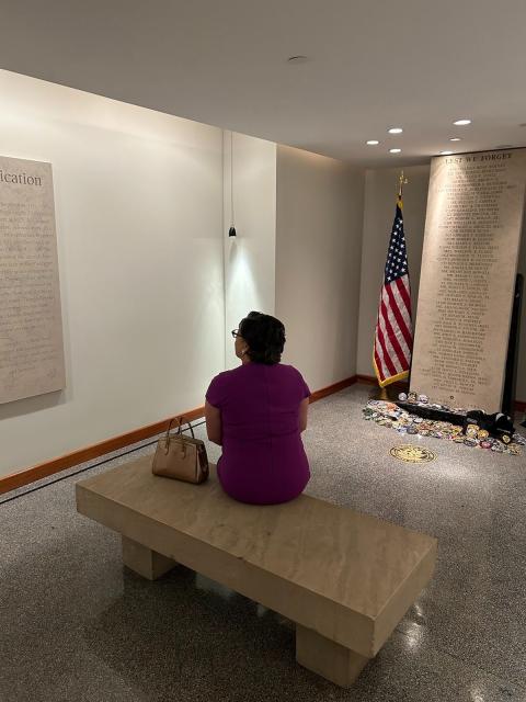Rep. McClellan sits in the 9/11 reflecting room