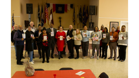 Photo of Rep. McClellan standing with staff and veterans at her 2025 Valentines for Vets event.