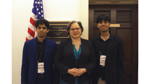 Photo of Rep. McClellan standing with the winners of the 2025 VA-04 Congressional App Challenge.
