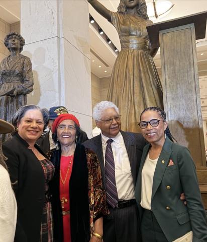 Photo of Rep. McClellan with Barbara Johns' family in front of the Barbara Johns statue.