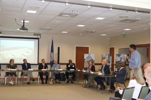 Photo of Rep. McClellan, Senator Warner and local and state elected officials at a wastewater roundtable.