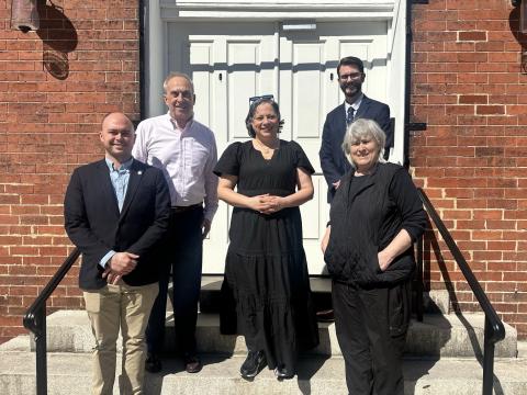 Photo of Rep. McClellan smiling with local officials from Petersburg, Colonial Heights and Hopewell.