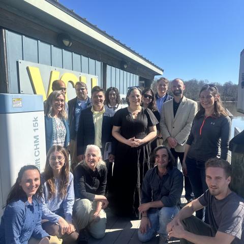 Photo of Rep. McClellan smiling with staff and students at the VCU Rice Rivers Center.