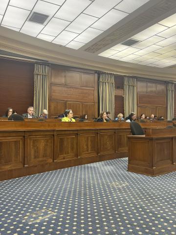 Rep. McClellan sits behind the dais at a Science, Space, and Technology Committee markup. 