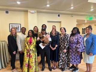 Photo of Rep. McClellan at ribbon cutting of the JXN Haus and Skipwith-Roper Cottage.