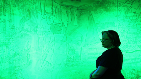 Photo of Rep. McClellan at Shockoe Institute exhibit.