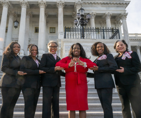 Photo of Rep. McClellan with Deltas.