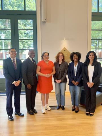 Photo of Rep. McClellan smiling with UVA Law students.