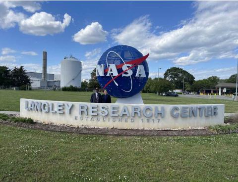 Rep. McClellan stands behind NASA Langley Research Center sign
