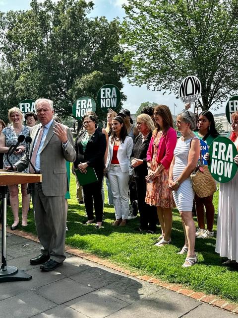 Senator Tim Kaine stands in front of the US Capitol
